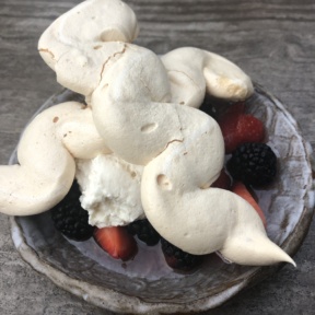 Pavlova with berries and whipped cream from Makani