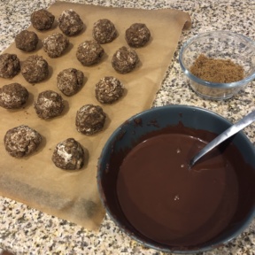 Making Gingerbread Truffles with melted chocolate