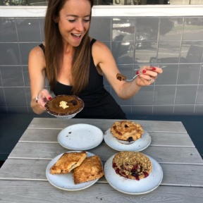 Jackie eating pies at Winston Pies