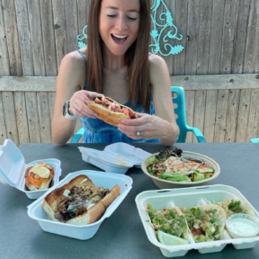 Jackie eating lunch at Heibeck's Stand