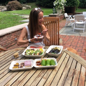 Jackie and Odie eating food from Catch A Healthy Habit Cafe