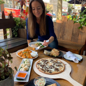 Jackie eating at Exit 4 Food Hall in Mt. Kisco