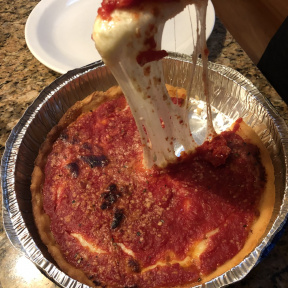 Cheesy deep dish pizza from Lou Malnati's