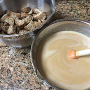 Bread cubes and batter for Pumpkin Bread Pudding