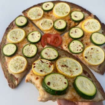 Slice of gluten-free zucchini pizza by Rich's Home