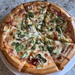 Shaved Brussels sprouts cheese pizza made with Rich's gluten-free pizza