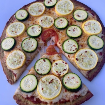 Gluten-free zucchini pizza crust by Rich's Home with toppings