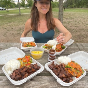 Jackie eating at Hawaiian Bros in Chicago
