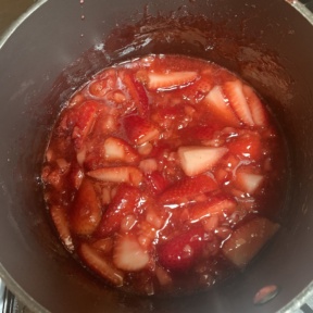 Making strawberry sauce for gluten-free Strawberry Cheesecake