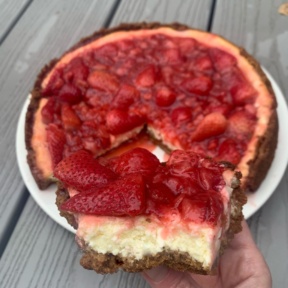 Big bite of Strawberry Cheesecake