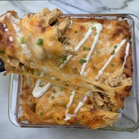 Cheese pull on gluten-free Buffalo Chicken Pasta Bake