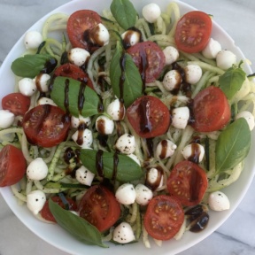 Gluten-free Caprese Zoodles with balsamic glaze