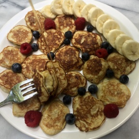 Gluten-free Mini Banana Stuffed Pancakes with maple syrup