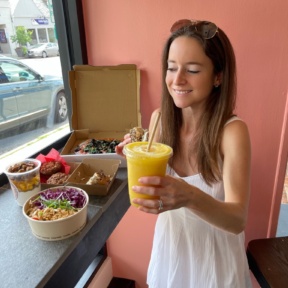 Jackie drinking a smoothie at Root2Rise NY