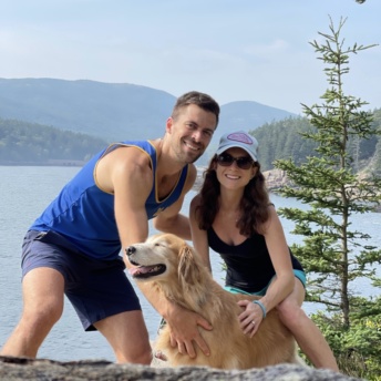 Jackie, Brendan, and Odie hiking in Acadia