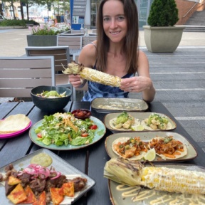 Jackie eating corn at Rosa Mexicano