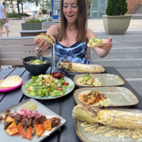 Jackie eating gluten-free tacos from Rosa Mexicano