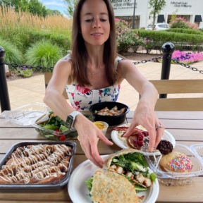 Jackie eating a gluten-free lunch from Twist Bakery Cafe