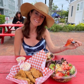 Jackie eating lobster at Lobster Cooker