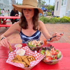 Jackie eating chicken tenders at Lobster Cooker