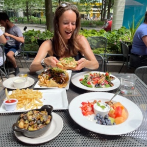 Jackie eating a gluten-free lobster sandwich from D4 Irish Pub & Cafe