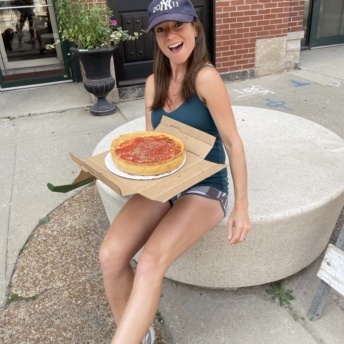 Jackie eating gluten-free deep dish pizza at Chicago's Pizza