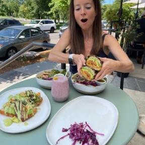 Jackie eating a sandwich from BRIM