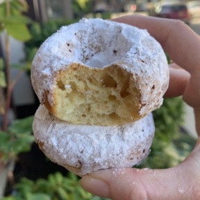 Stack of Baked Powdered Sugar Donuts