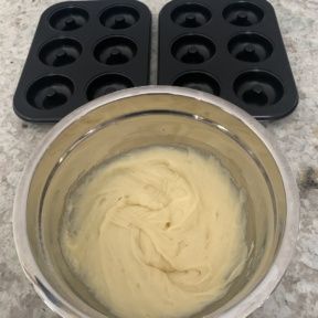 Making Baked Powdered Sugar Donuts