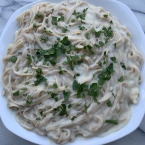 Gluten-free Fettuccine Alfredo with chopped parsley