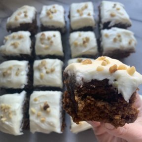 A bite of Gingerbread Cake with Cream Cheese Frosting