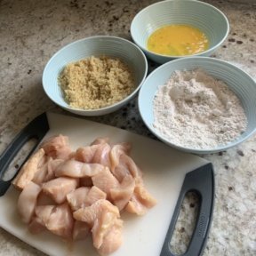 Making gluten free Quinoa Coated Chicken Nuggets