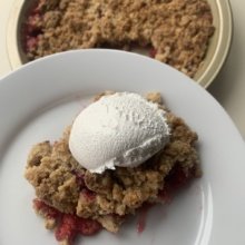 Eating gluten free Raspberry Crumble with whipped topping!