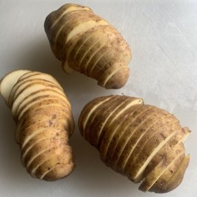 Cutting potatoes to make Baked Potato Chip Nachos