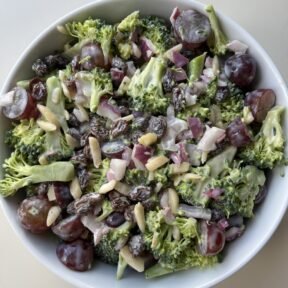 Delicious gluten-free Broccoli Grape Salad with raisins and almonds