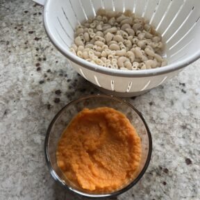 Making Hidden Carrot Mac & Cheese with pureed carrots and Jovial pasta